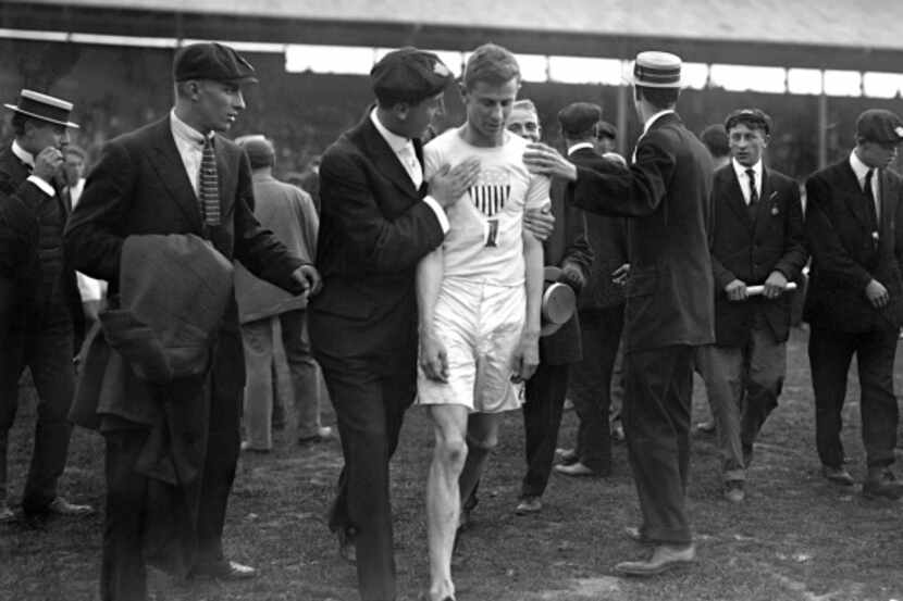USA's John Carpenter after the 400-meter final in the Summer Olympic Games in London in 1908.