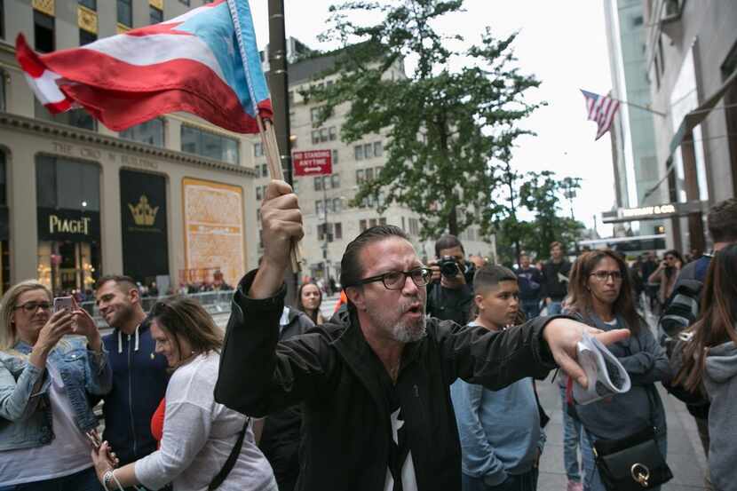 David Galarza confronts Trump supporters in front of Trump Tower on September 30, 2017 in...