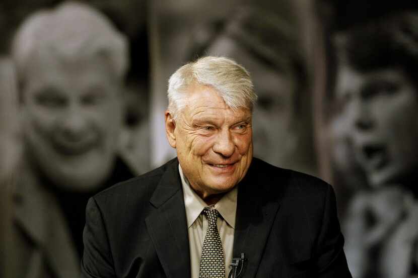 Former Golden State Warriors head coach Don Nelson smiles while being interviewed at the...