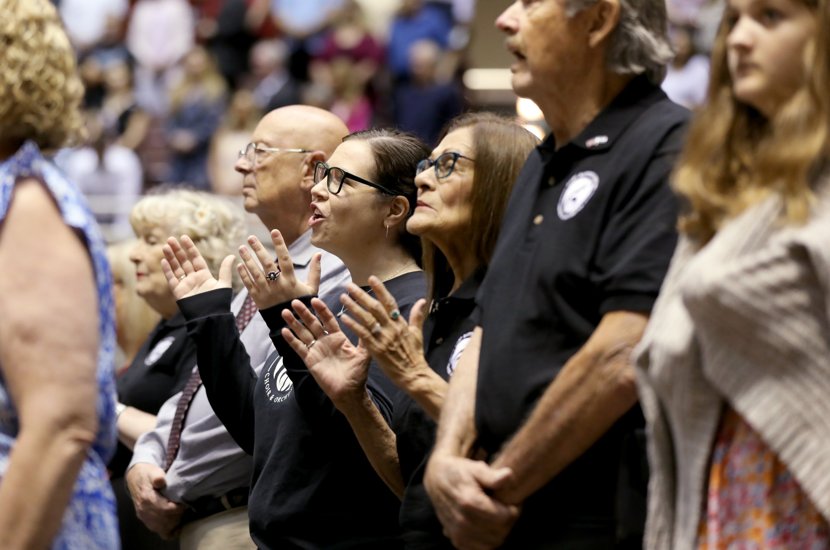 First Baptist Church members participate in Sunday service held at the Dallas Convention...