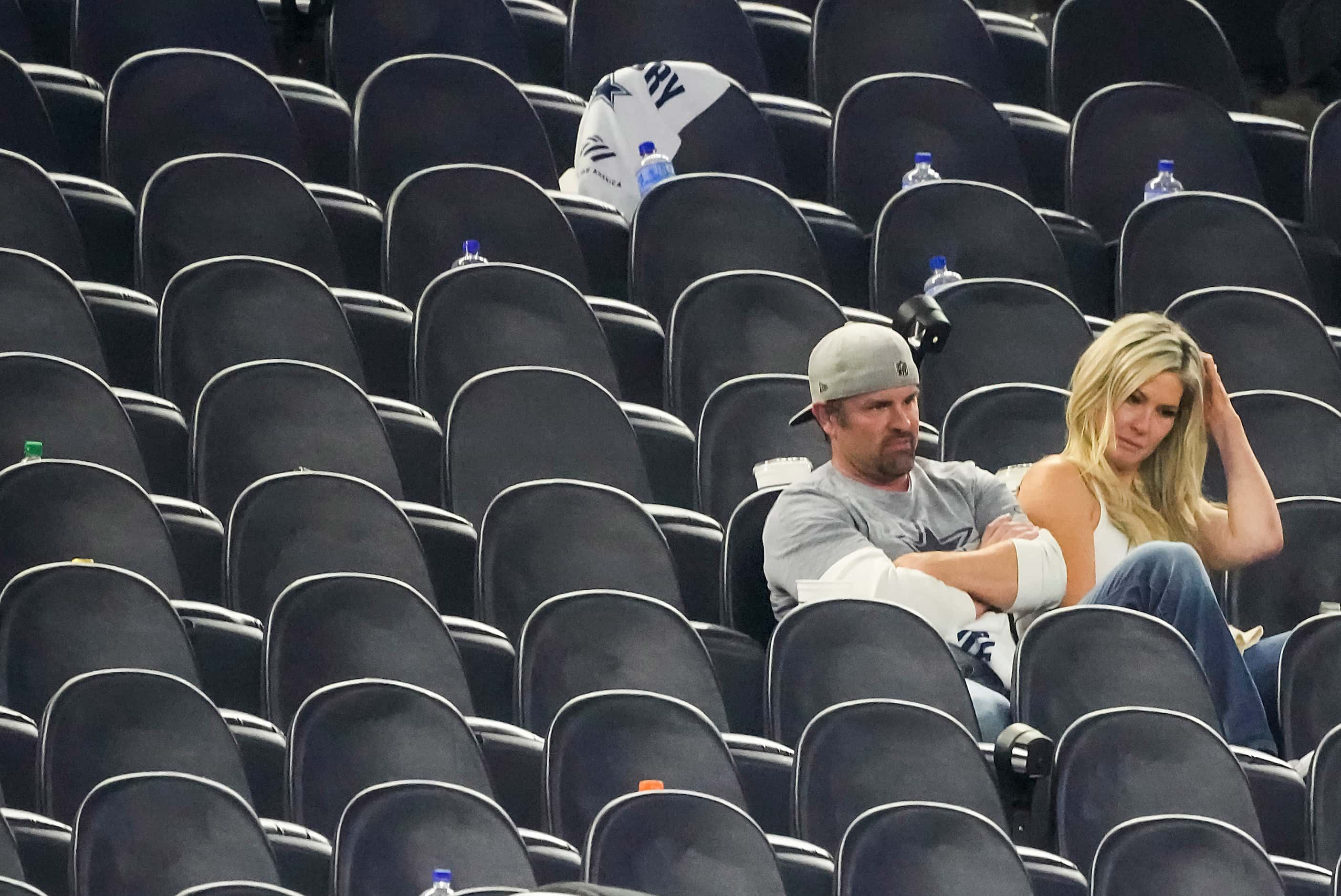 Dallas Cowboys fans react as the watch players leave the field following a loss to the San...