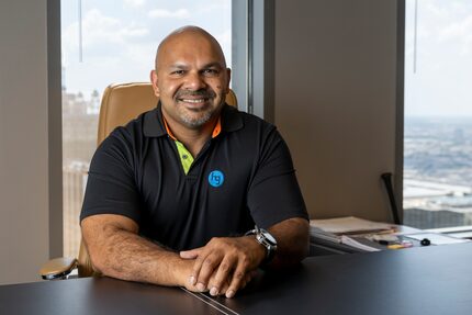 Hoque Global CEO Mike Hoque in his office at the Comerica Bank Tower in Dallas. He is...