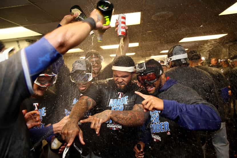 OAKLAND, CA - SEPTEMBER 23:  The Texas Rangers, including Prince Fielder in the center,...
