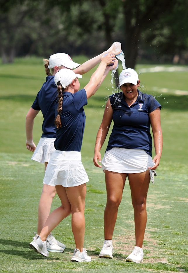 Frisco Centennial’s Tarini Bhoga  celebrates with teammates after winning individual first...