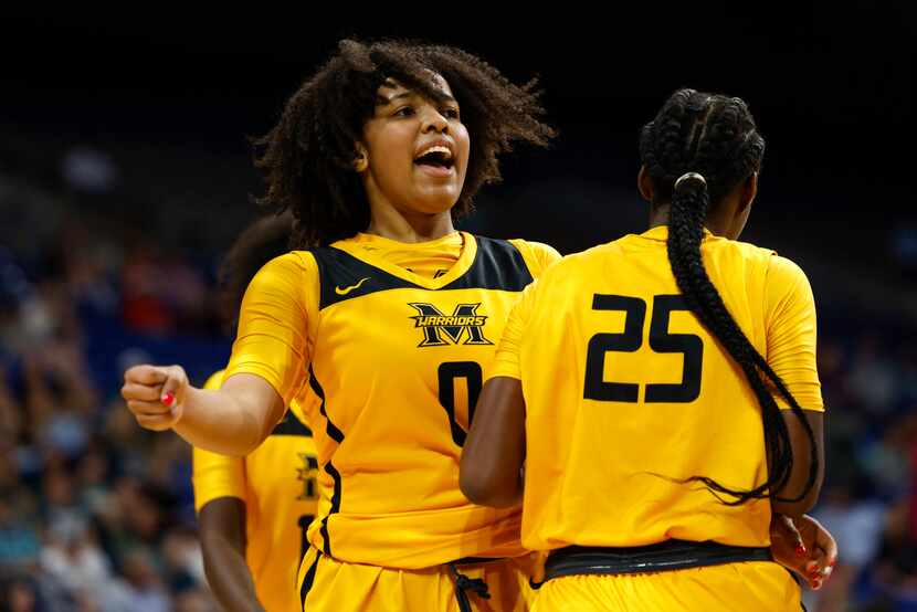 Frisco Memorial guard Brynn Lusby (0) celebrates after a play with Frisco Memorial guard...