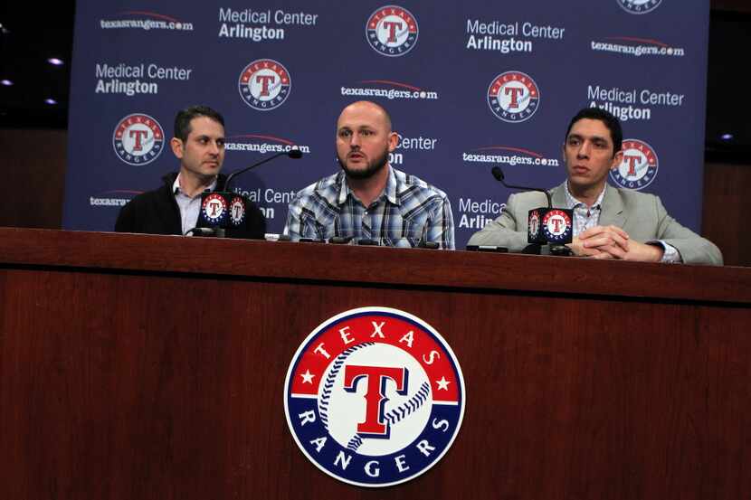 Texas Rangers Assistant General Manager Thad Levine, left, and General Manager Jon...