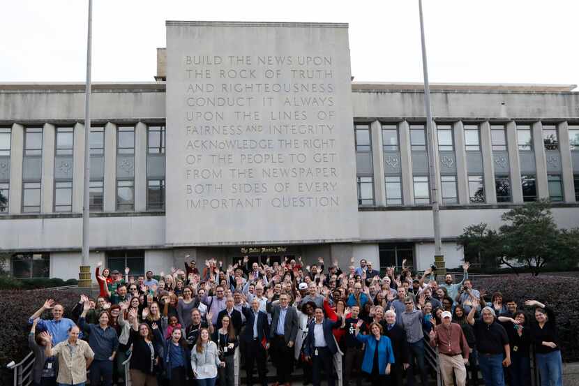 Dallas Morning News employees gathered in front of the Rock of Truth on their last official...