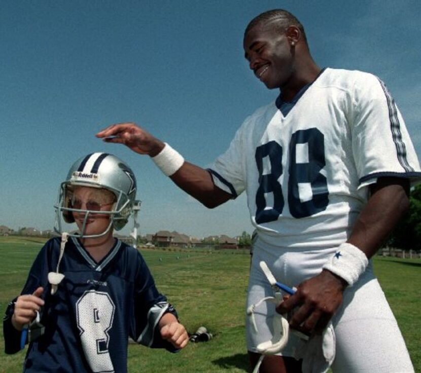 ORG XMIT:  Ten year-old Garrett Van Allen, left, of Mesquite, is all smiles after Dallas...