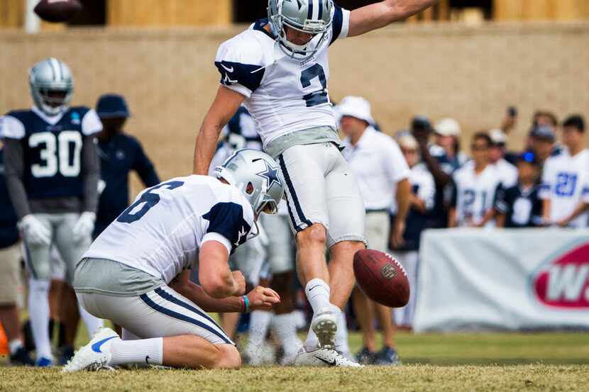 Dallas Cowboys kicker Brett Maher (2) kicks a field goal with punter Chris Jones (6) during...