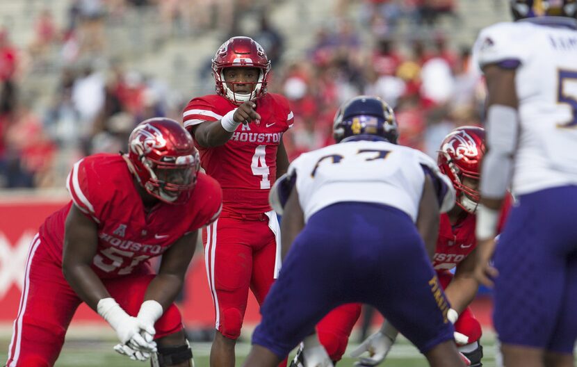 HOUSTON, TX - NOVEMBER 04:  D'Eriq King #4 of the Houston Cougars points at the line of...