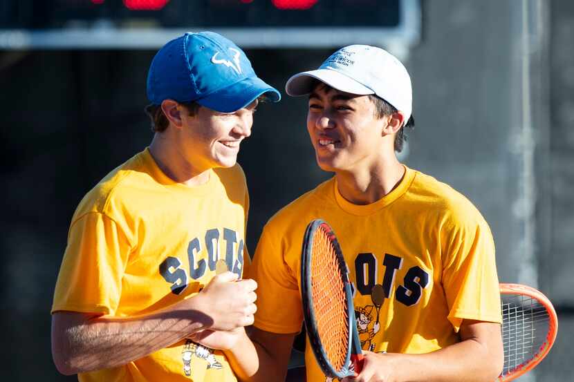 Highland Park’s Carl Newell, left, and William Covin celebrate during a double match against...