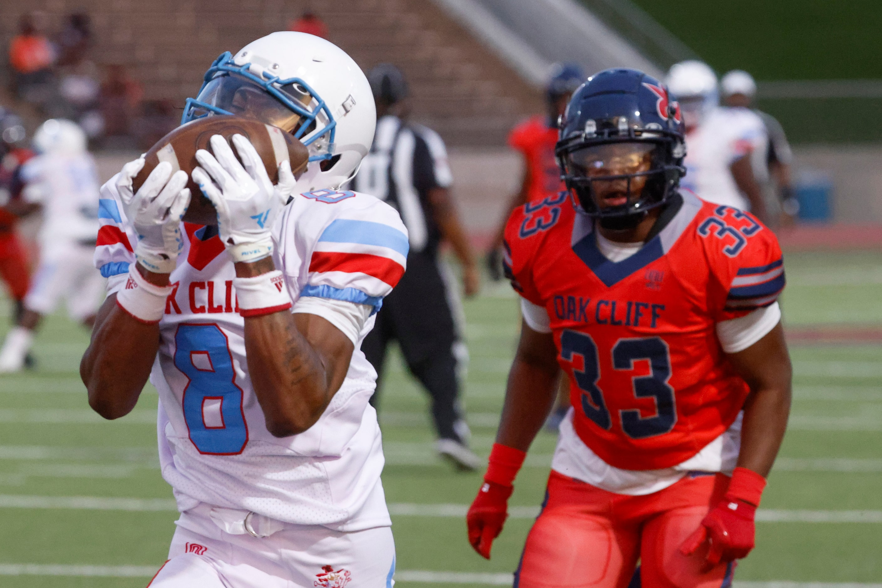 Carter High’s O’ryan Wallace (8) makes a touchdown past Kimball High’s Llyod Lewis during...