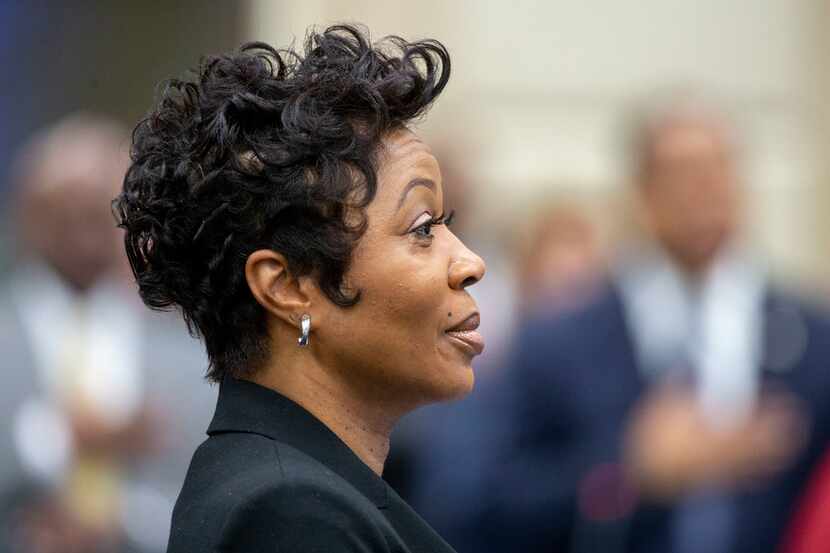 Police Chief U. ReneÃ© Hall Stands for the National Anthem before a City Council briefing on...