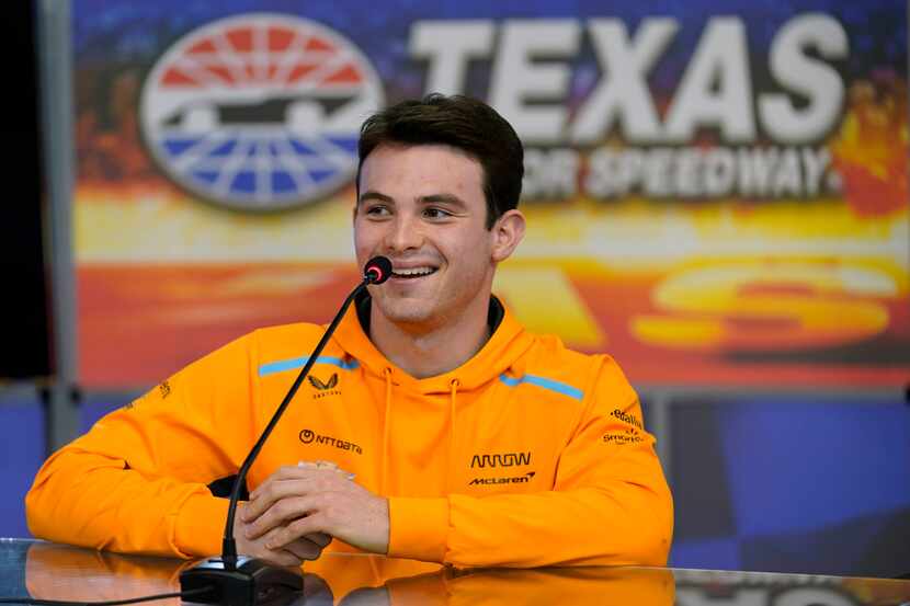 IndyCar Series driver Pato O'Ward, of Mexico, laughs as he speaks to reporters at Texas...