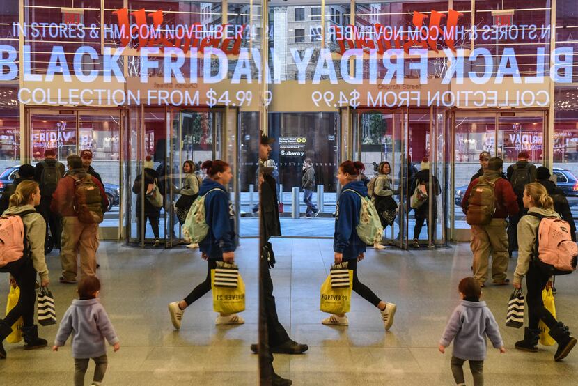 People shop at a H&M store on "Black Friday" on Nov. 24 in New York. 