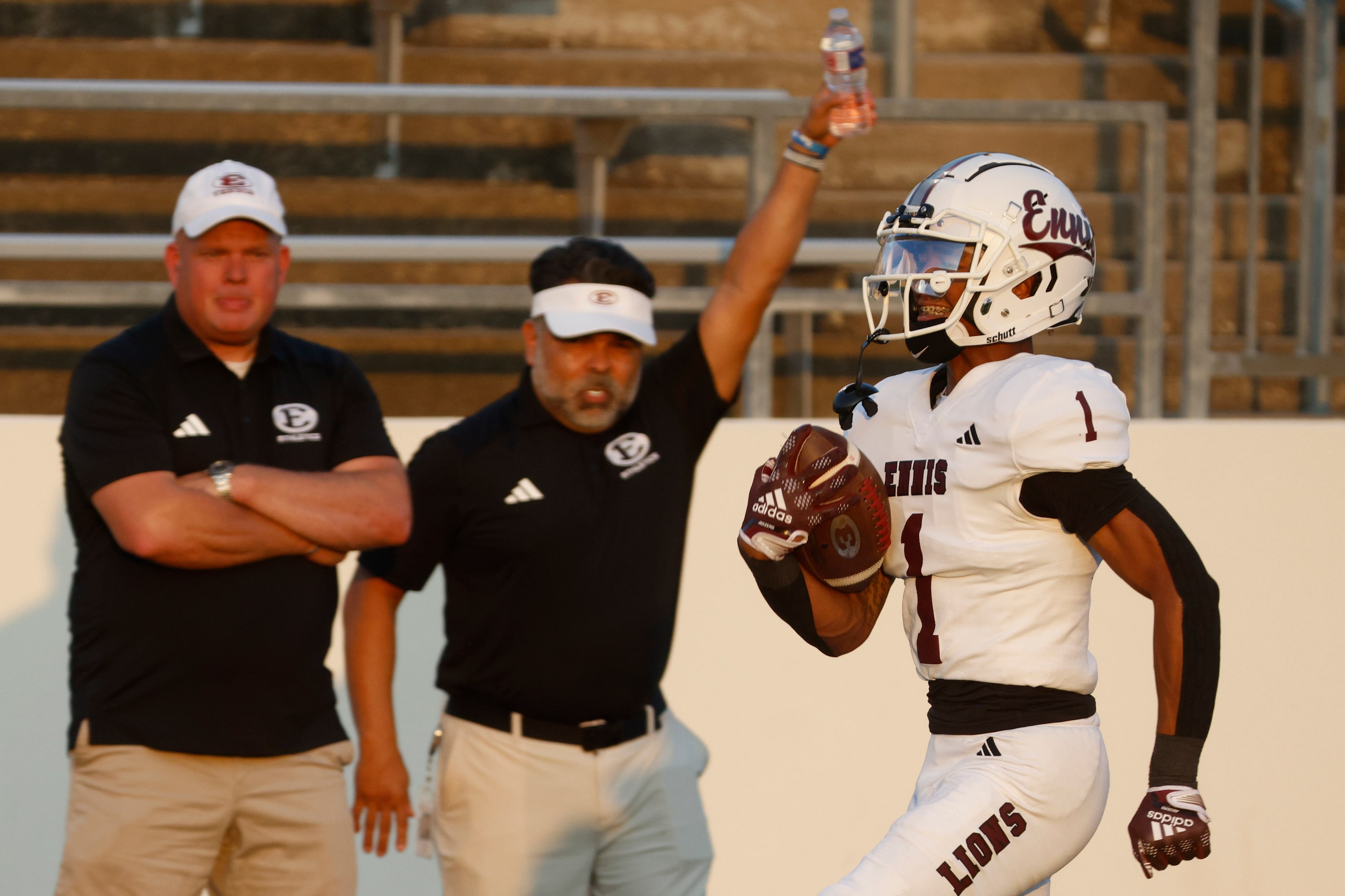 Ennis’ WR Gracen Harris runs for a yardage during the first half of a football game against...