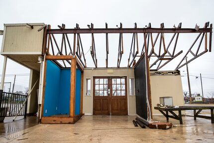 The facade of the old storefront building is one of the few structural remains at North...