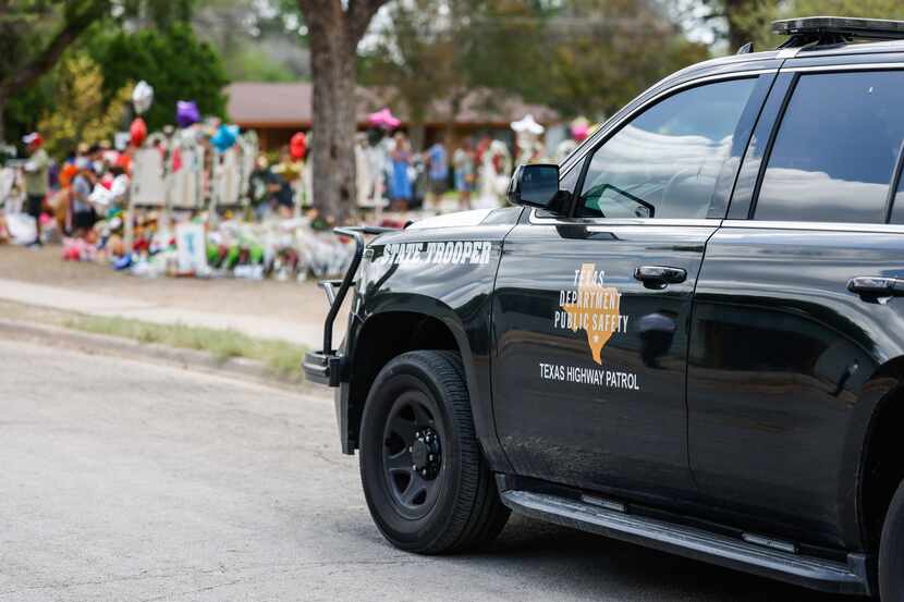 A Texas State Trooper SUV parked near a building at Robb Elementary School in Uvalde, Texas,...
