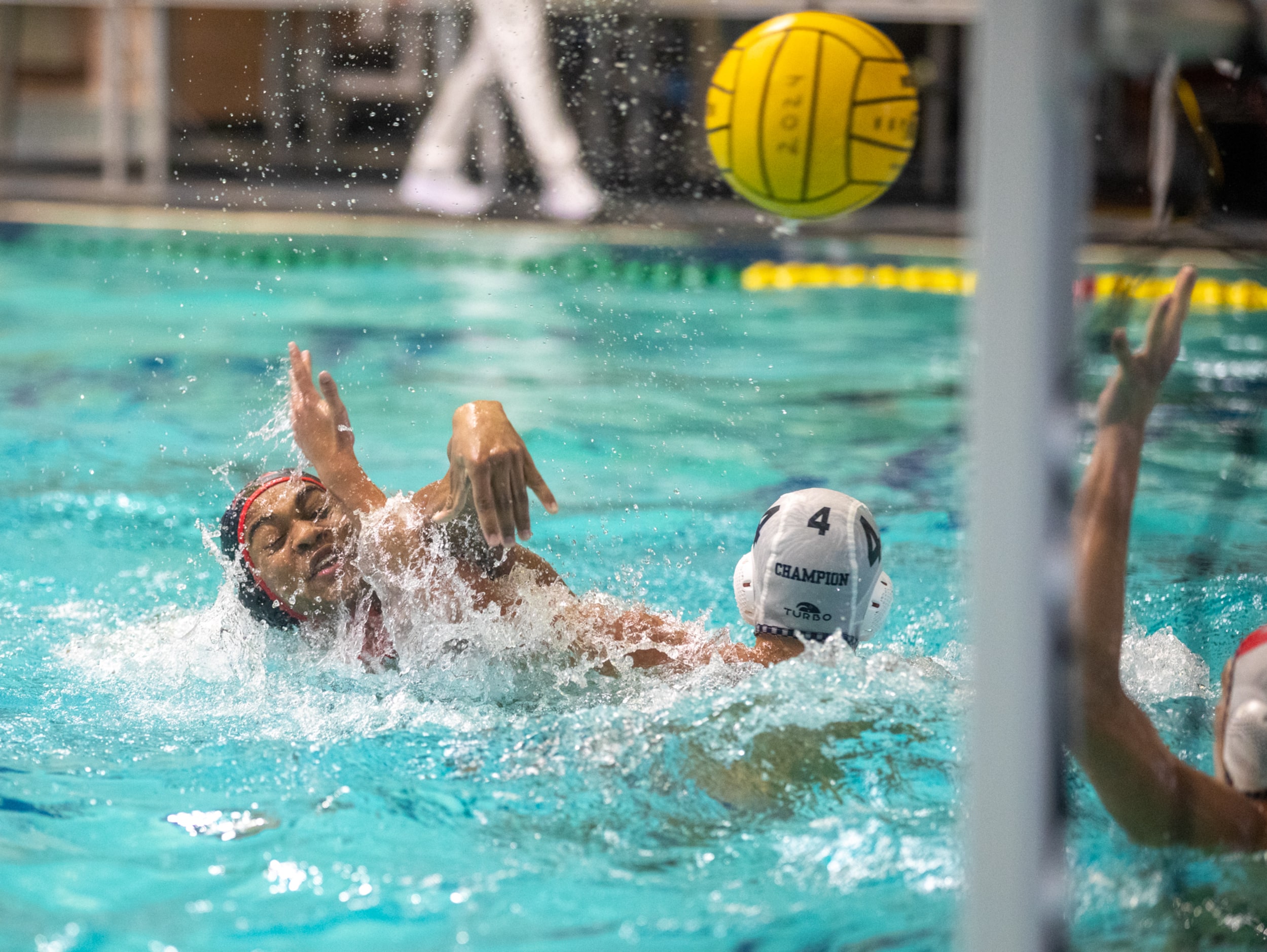 Flower Mound Marcus 2-meter Deven Lloyd scores on a shot as Boerne Champion utility Baylor...