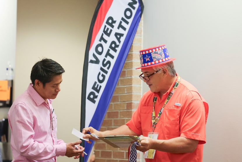 Benny de la Vega, 54, (right) originally from the Philippines, became a U.S. citizen in...