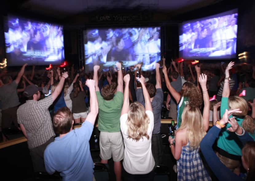 Fans celebrate the Mavericks game at Granada Theater in Dallas, TX, on June 12, 2011.