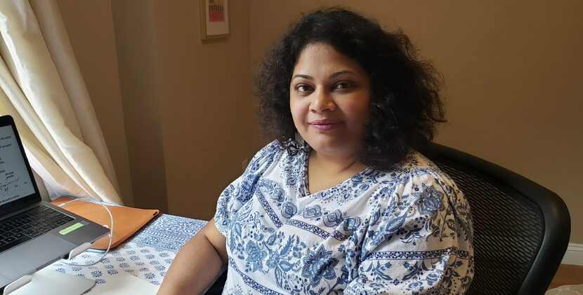 Chandramallika Basak poses at her remote workspace in Boston, Massachusetts in August, 2020....