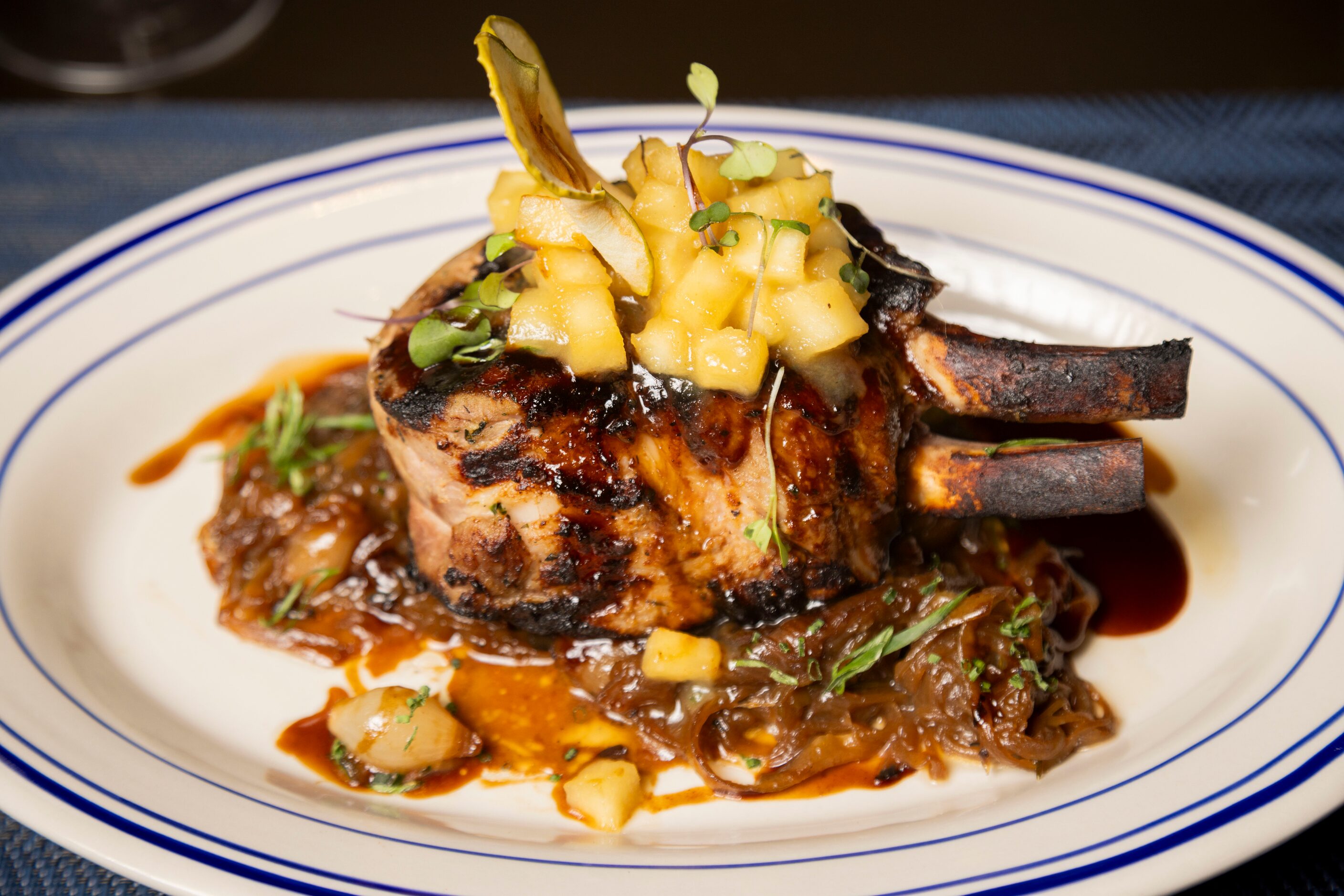 The Berkshire Pork Chop is one of the more dramatic dishes at Wicked Butcher.