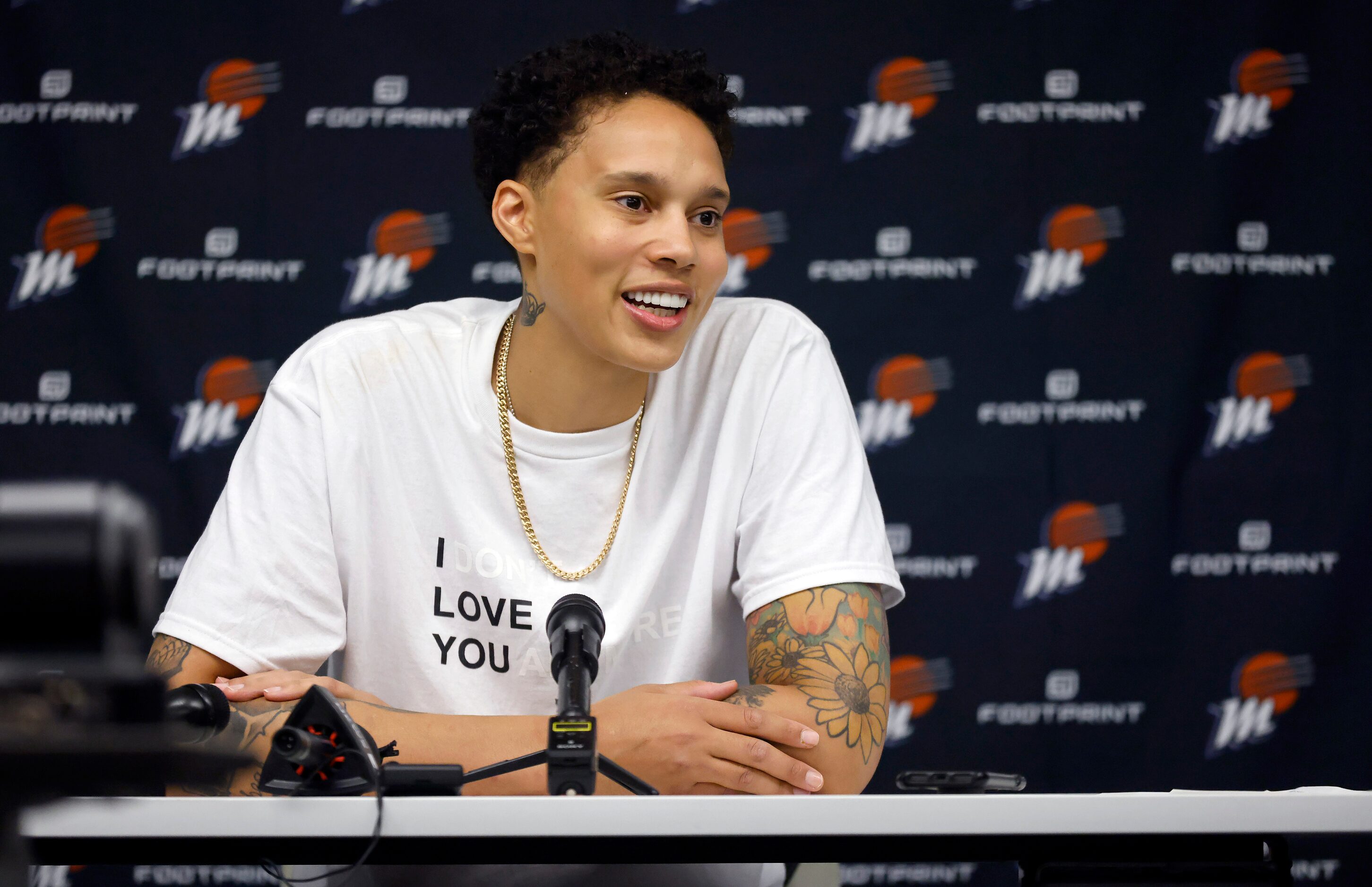 Phoenix Mercury center Brittney Griner (42) answers questions from the media following her...