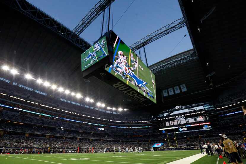 The roof and doors of AT&T Stadium were open in Arlington for Monday Night Football between...