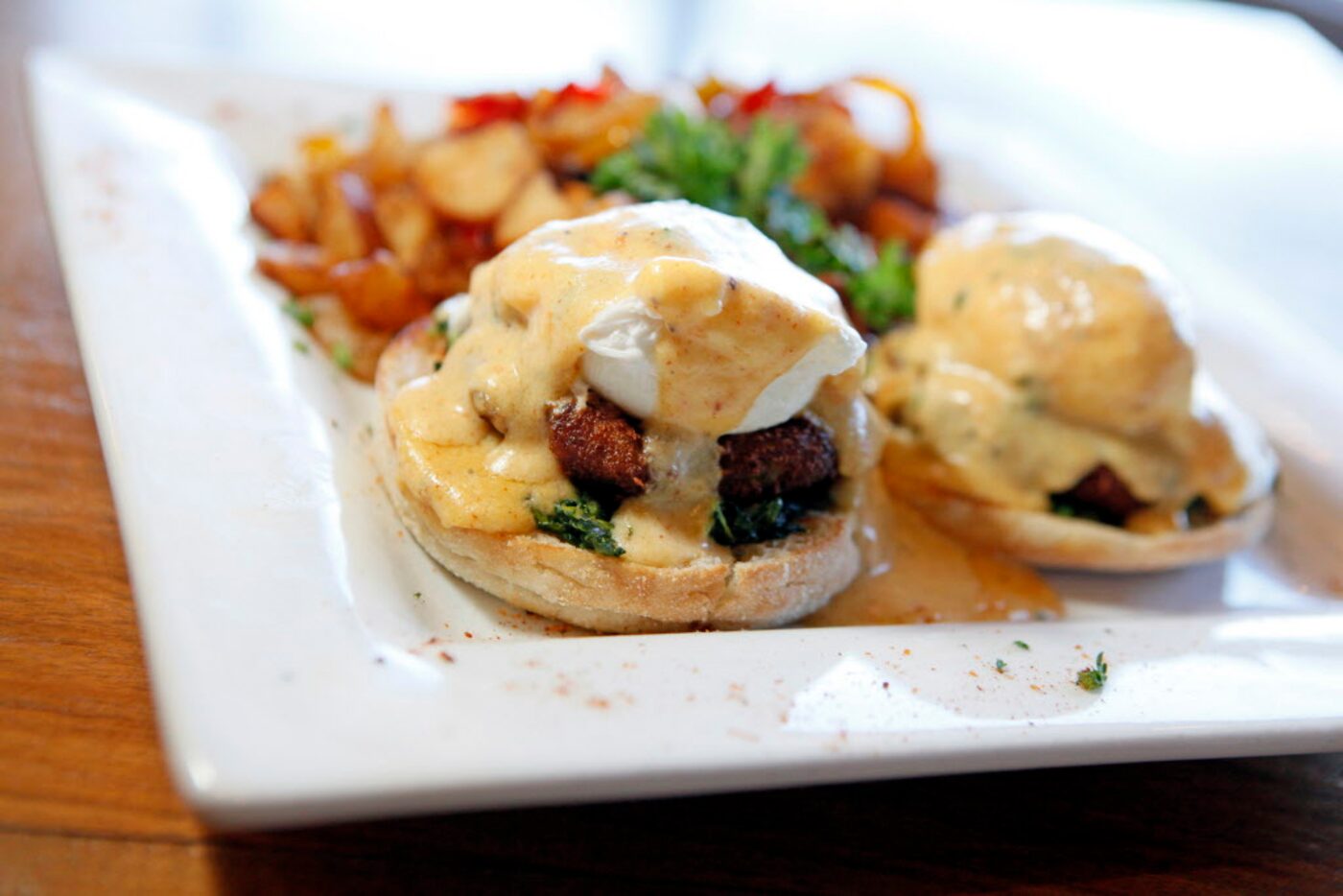 Crabcake florentine with fresh spinach, two poached eggs and a spicy creole hollandaise...