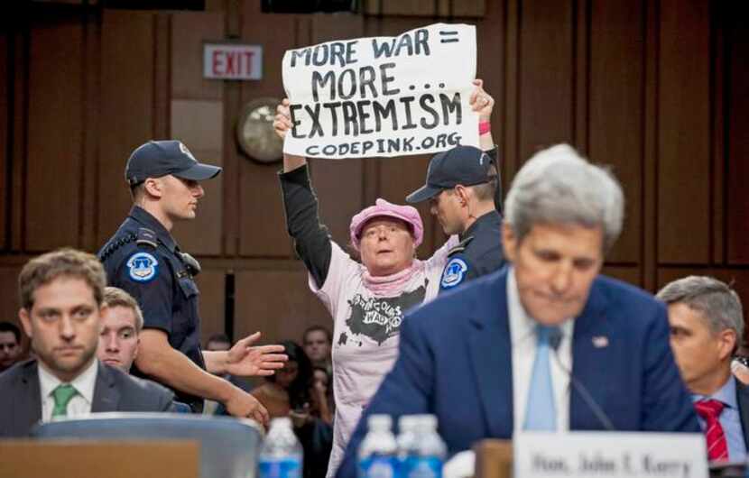 
A member of the women’s peace group Code Pink disrupted Secretary of State John Kerry’s...
