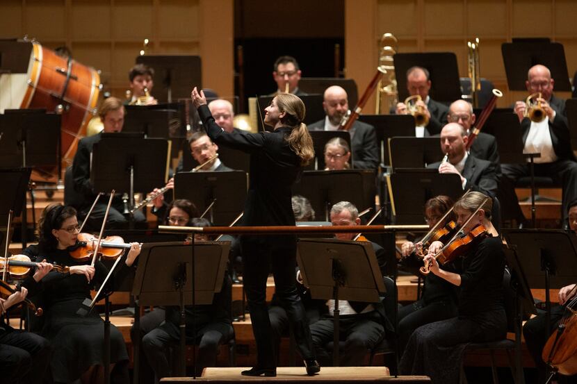 Guest conductor Karina Canellakis conducts the Dallas Symphony Orchestra at The Morton H....