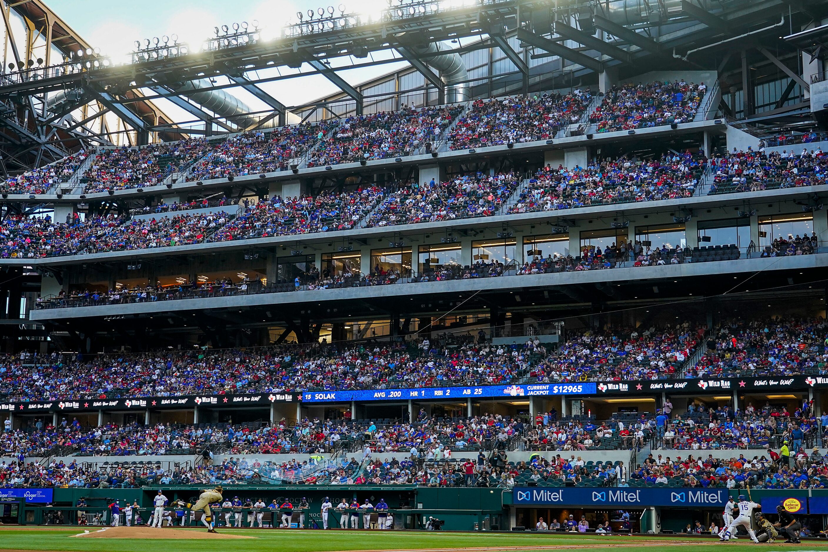 San Diego Padres starting pitcher Chris Paddack delivers to Texas Rangers second baseman...