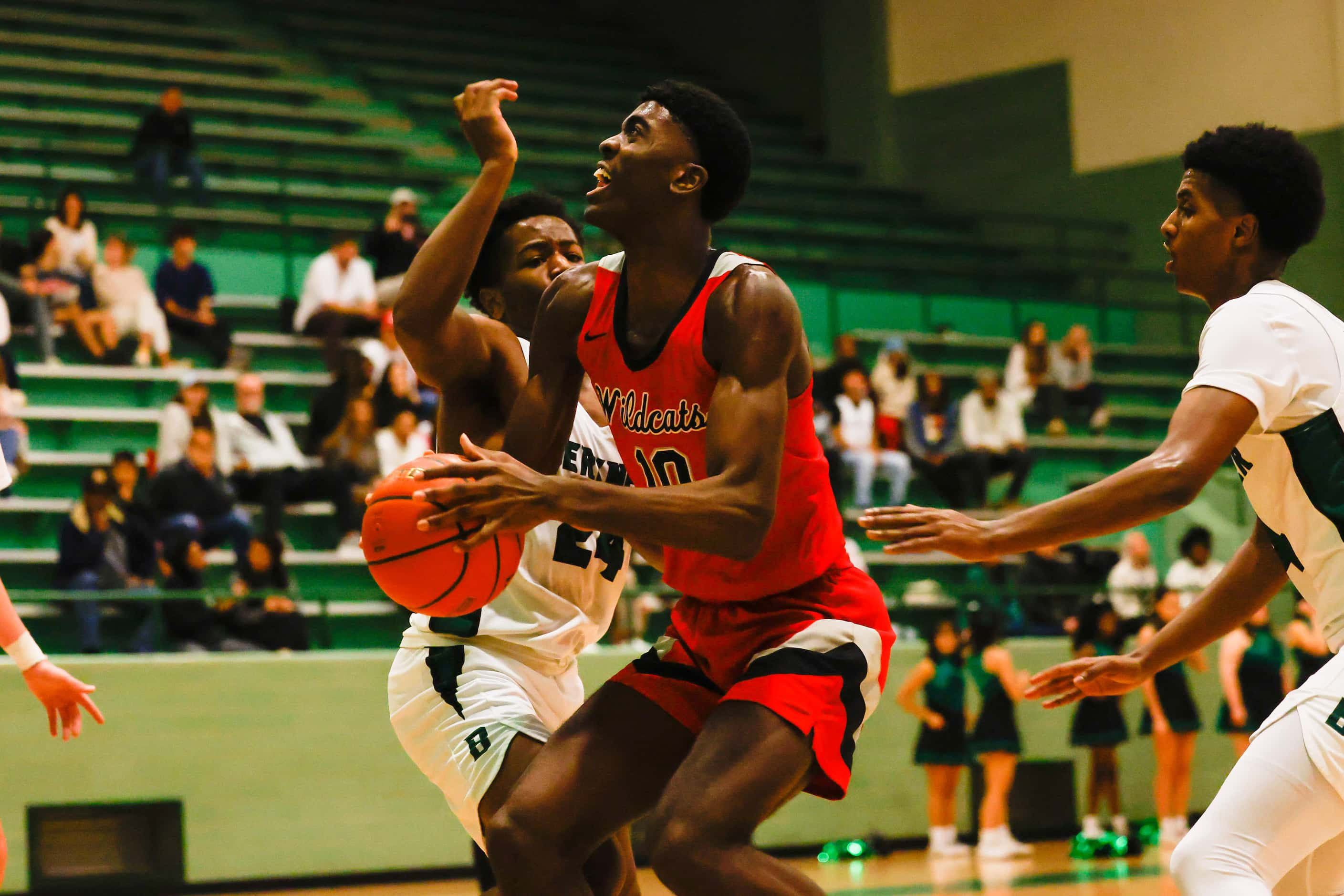 Lake Highlands High School' Samson Aletan #10, goes for a shot during the second half...