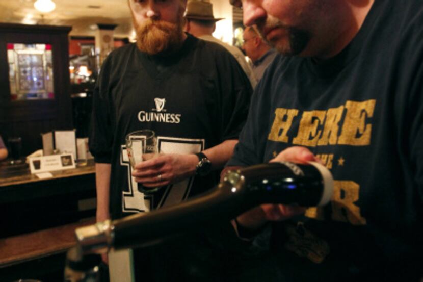 John Haughey and Richard Willemin enjoyed glasses of Guinness at "Pour Your Own Pint Night"...