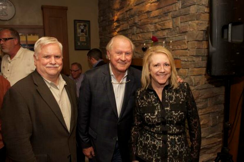 Steve Richardson (left) greeted Phil and Janet Cobb, who are behind the redevelopment of the...