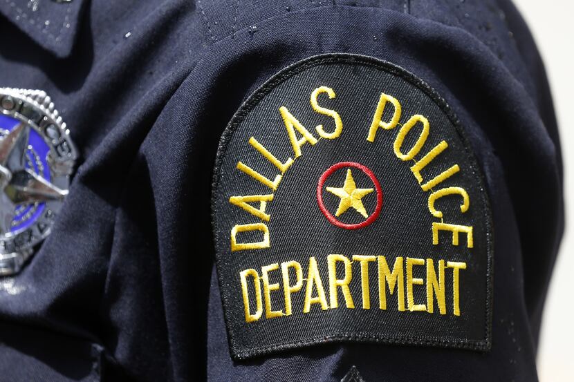 Two Dallas police officers were fired Thursday following investigations into criminal...