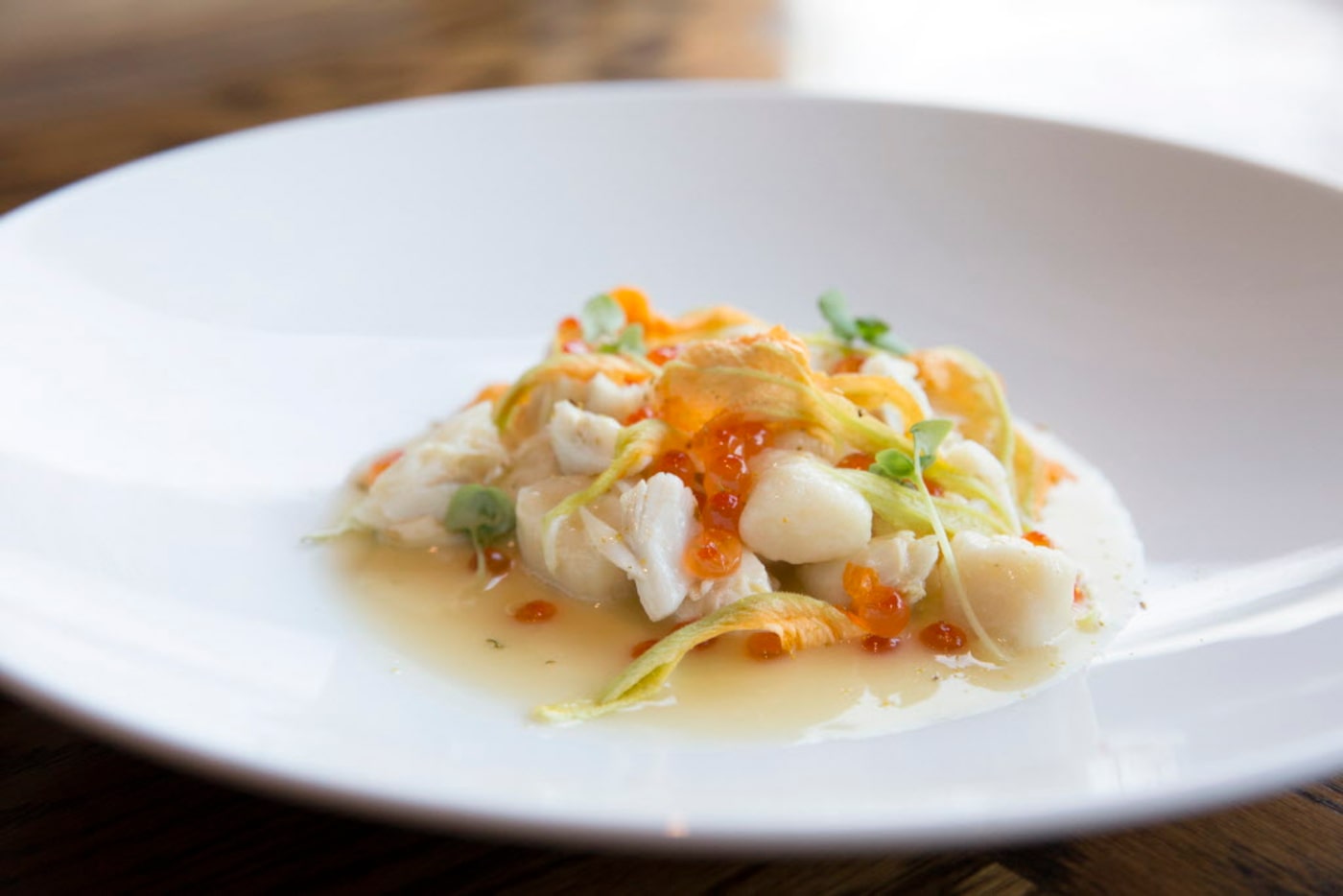 Oak's gnocchi with crab, squash blossom and smoked trout roe 