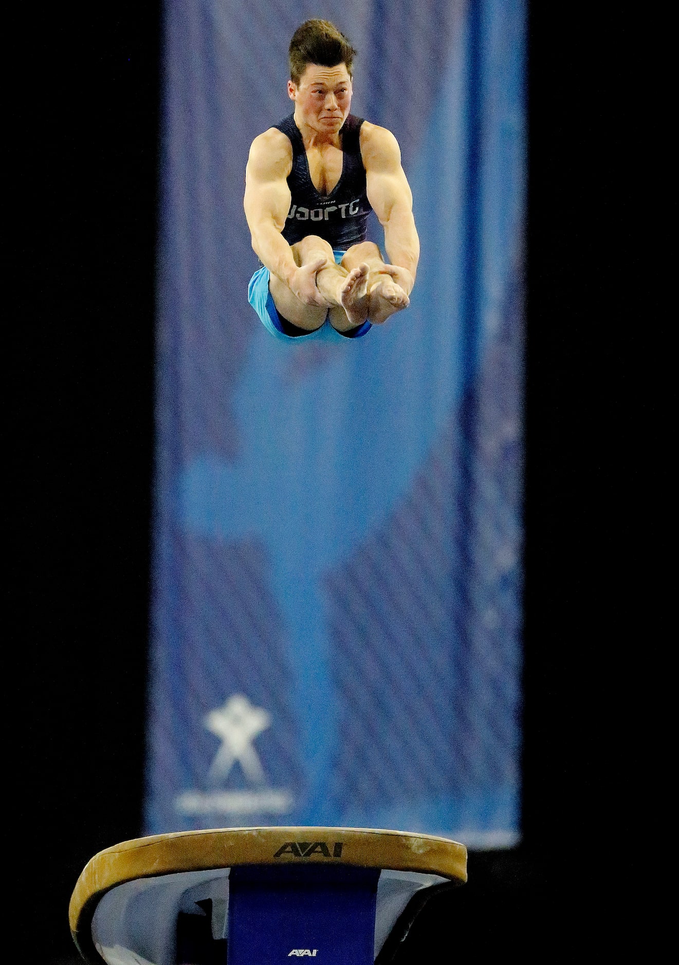 A;ex Doab with USOPTC rises up off of the vault during the mens finals at the USA Gymnastics...