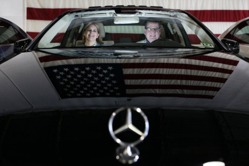 TexasCarsDirect owner Pete Bulban, with wife Jenny, sold a record $46 million in luxury...