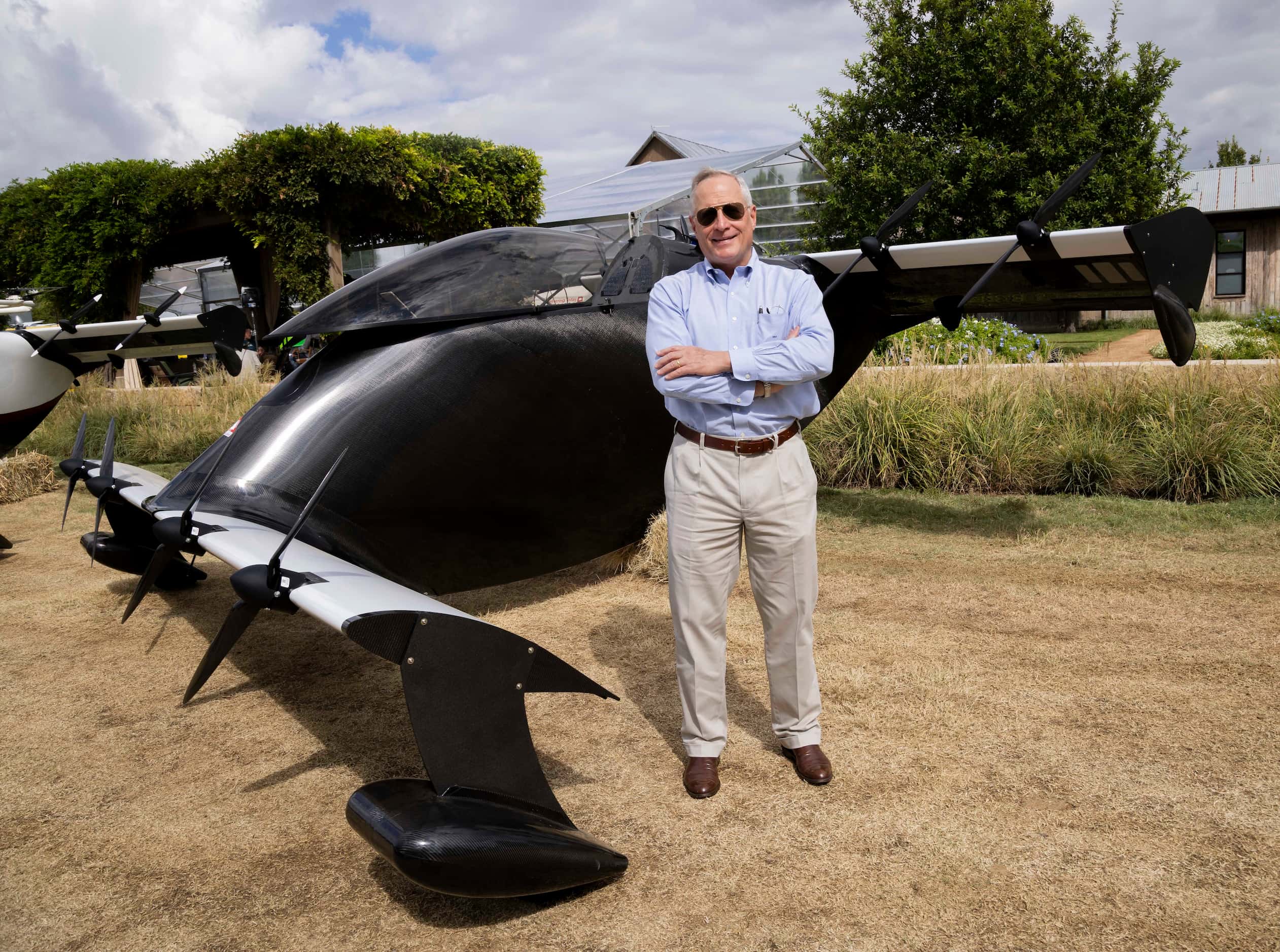 Ross Perot Jr. poses with Pivotal’s BlackFly eVTOL during the UP.Summit 2023 at the Circle T...