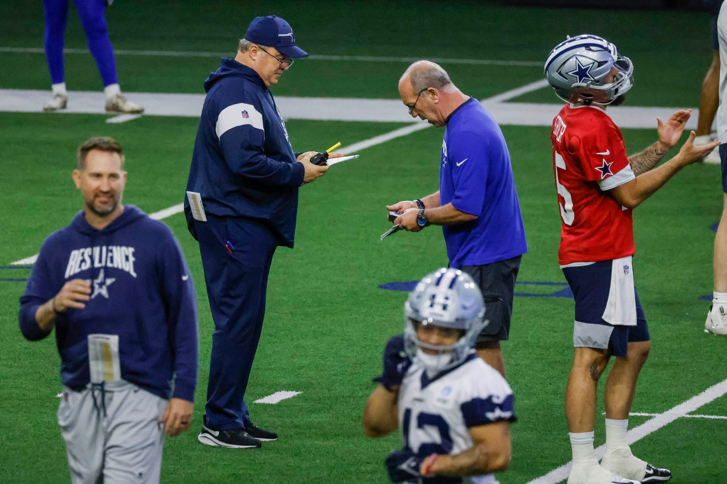 Dallas Cowboys head coach Mike McCarthy talks to officials during OTA practice on Thursday,...