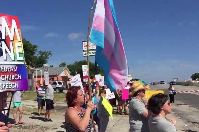 LGBT activists march on the Jacksboro Highway June 26 to protest the controversial comments...