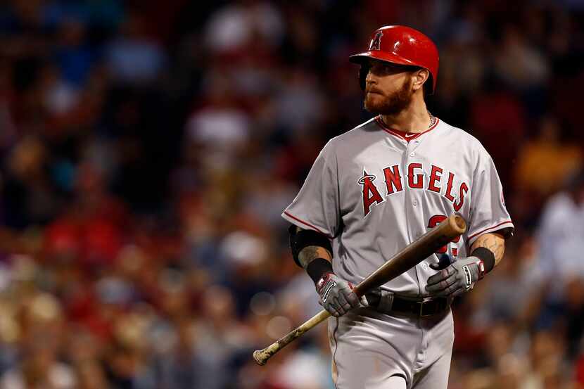 Aug 19, 2014; Boston, MA, USA; Los Angeles Angels left fielder Josh Hamilton (32) reacts...