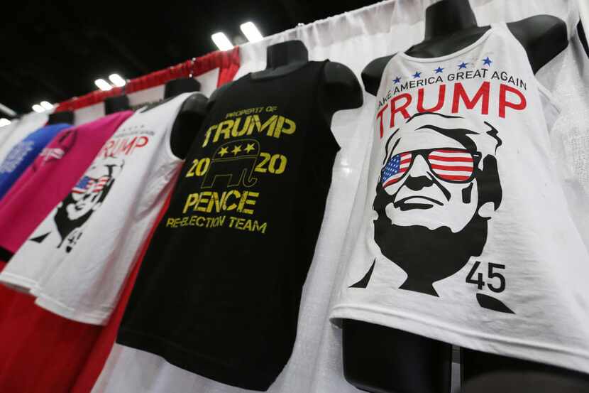A variety of tee shirts are displayed for sale at the 2018 Texas GOP Convention held at the...