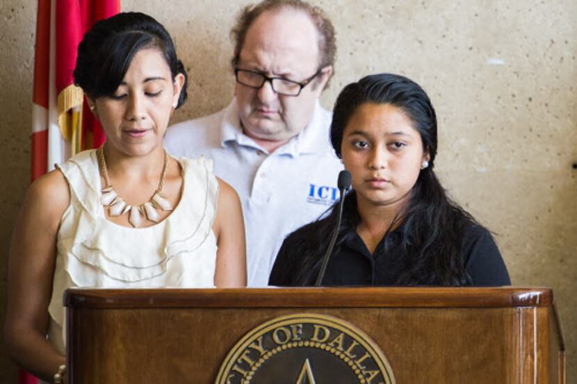 Fourteen-year-old Sylvia Marroquin (right) spoke at a press conference in Dallas Monday,...