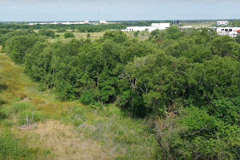 The 325-acre Greenbelt development is planned on Interstate 30 about four miles south of...