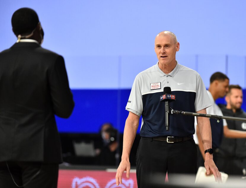 Orlando, FL - JULY 28: Mavericks head coach Rick Carlisle is interviewed during a scrimmage...