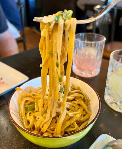 The garlic noodles at Mot Hai Ba are marked as a side dish, but they're my favorite item at...