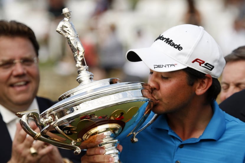 Jason Day kisses the trophy on the 18th hole during the final round of the 2010 HP Byron...